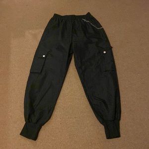 Size 2(small) women. Cargo pants can be worn dressed up or down.(Chain attached)